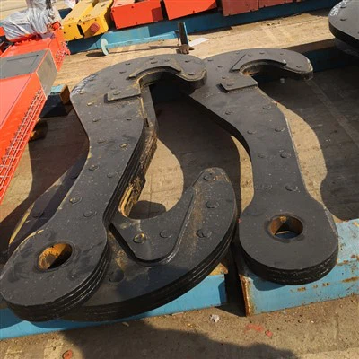 Laminiran kavelj za zajemalko